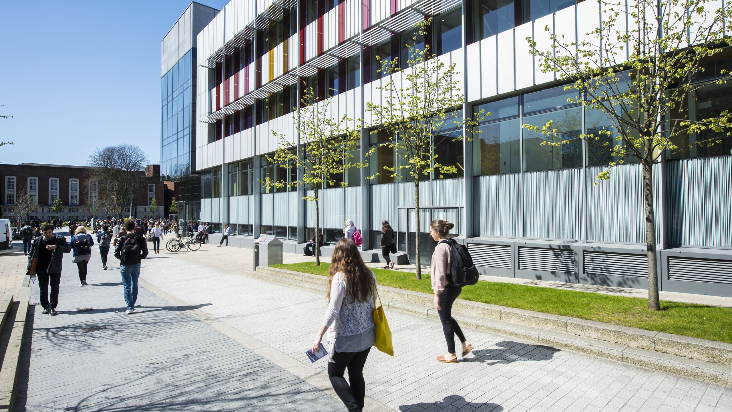 Students pass by Alan Gilbert Learning Commons.