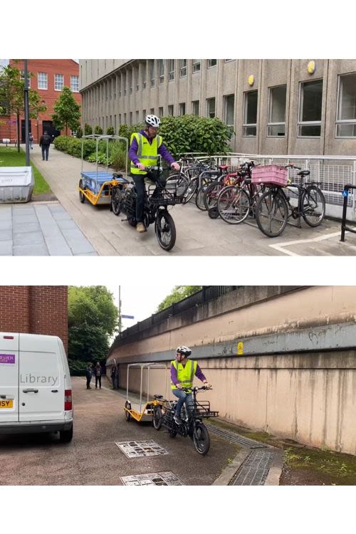 A member of Library staff riding the e-Cargo bike and trailer