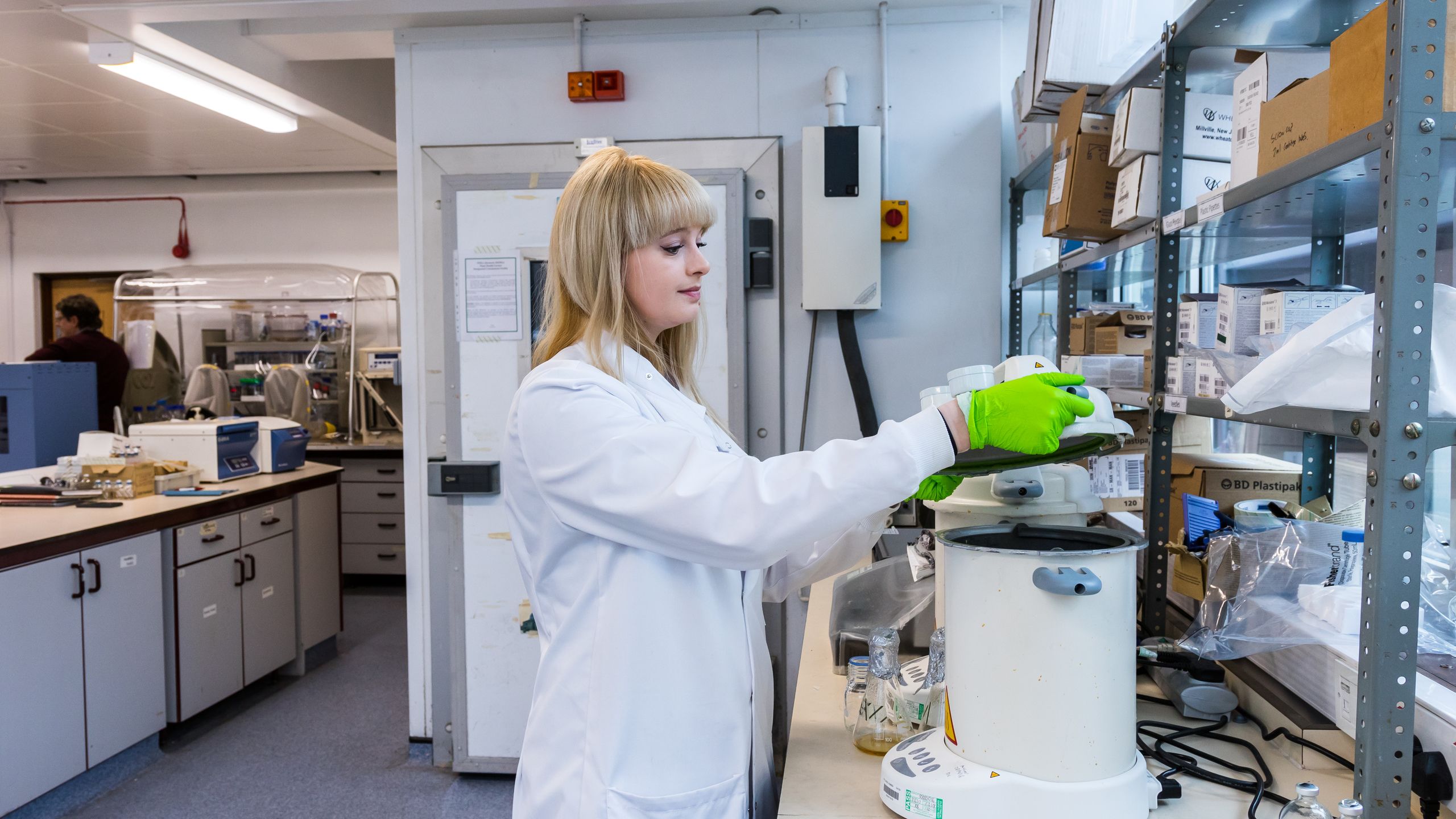 Woman in a laboratory using equipment
