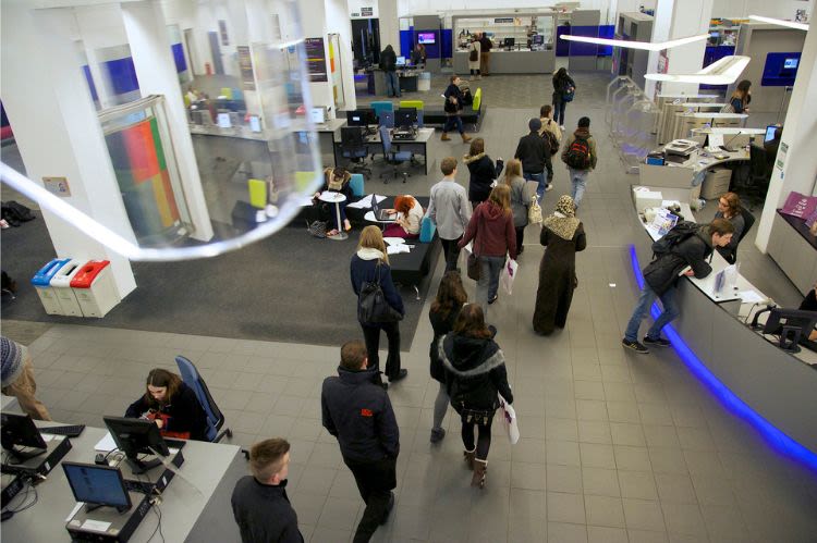 Students walking around on Blue Ground, photographed from above