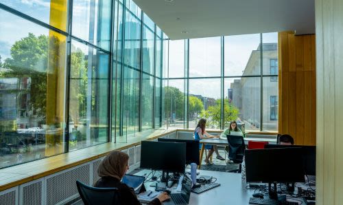 Students in the study space on the first floor of AGLC