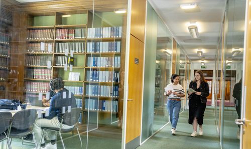 Green 2 area in Main Library with Library users sitting and walking