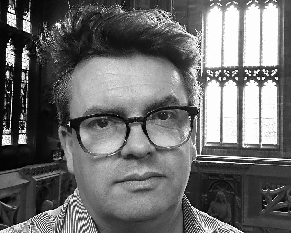 Professor Christopher Pressler in the old quad at University of Manchester