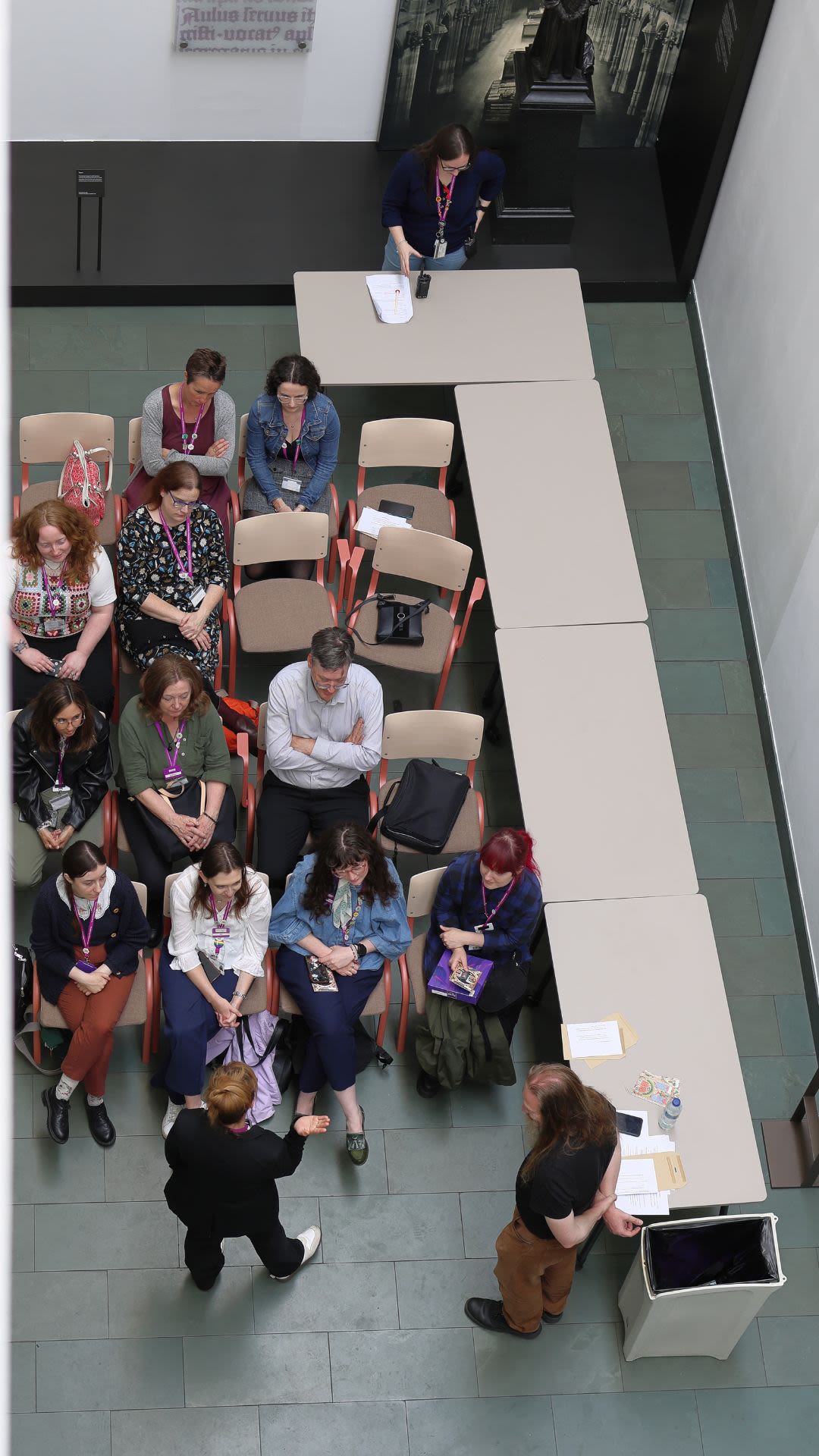 Library staff sitting in a breakout session at the Together conference as seen from above