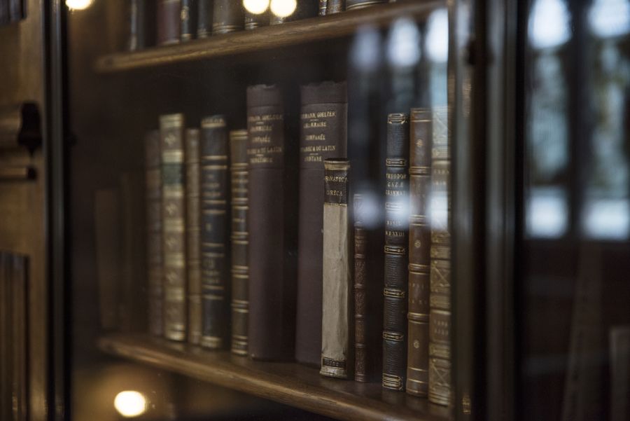 Row of books in a cabinet in Rylands