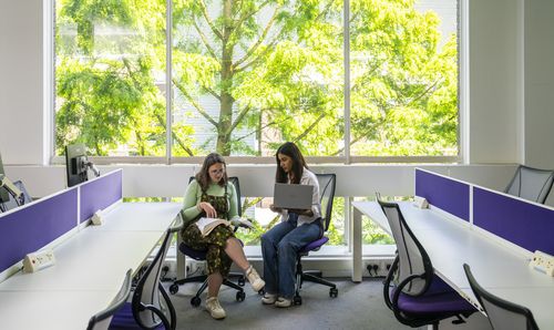 Two students in Stopford Library
